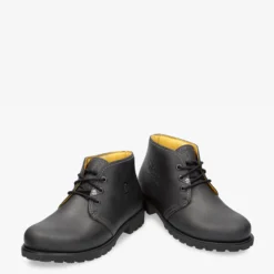 Bota Panama Botín de piel con forro interior de piel.