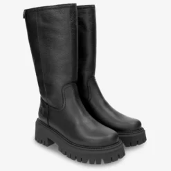 Charlotte Botas de piel con forro interior de pelo.