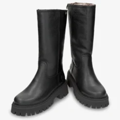 Charlotte Botas de piel con forro interior de pelo.