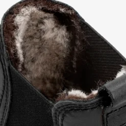 Pia Trav Botín de piel con forro interior de pelo.