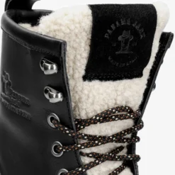 Tibi Botas de piel con forro interior de pelo.