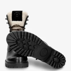 Tibi Botas de piel con forro interior de pelo.